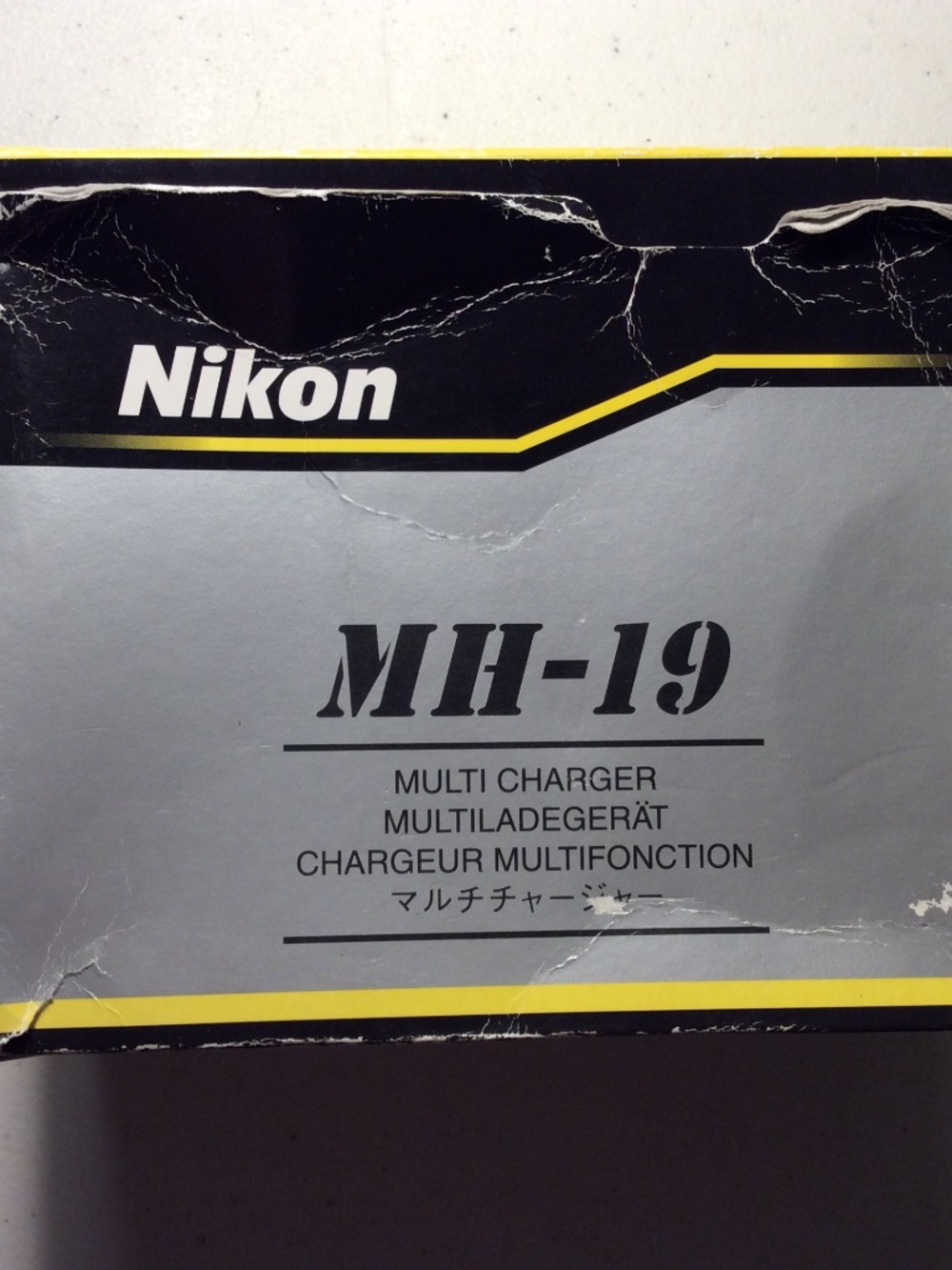 Nikon Battery Charger and 3 Nikon Batteries